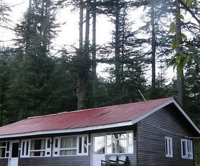 https://imgcld.yatra.com/ytimages/image/upload/t_hotel_yatra_city_desktop/v1450685848/Domestic Hotels/Hotels_Manali/The Hadimba Cottage/Outer_view_1.jpg